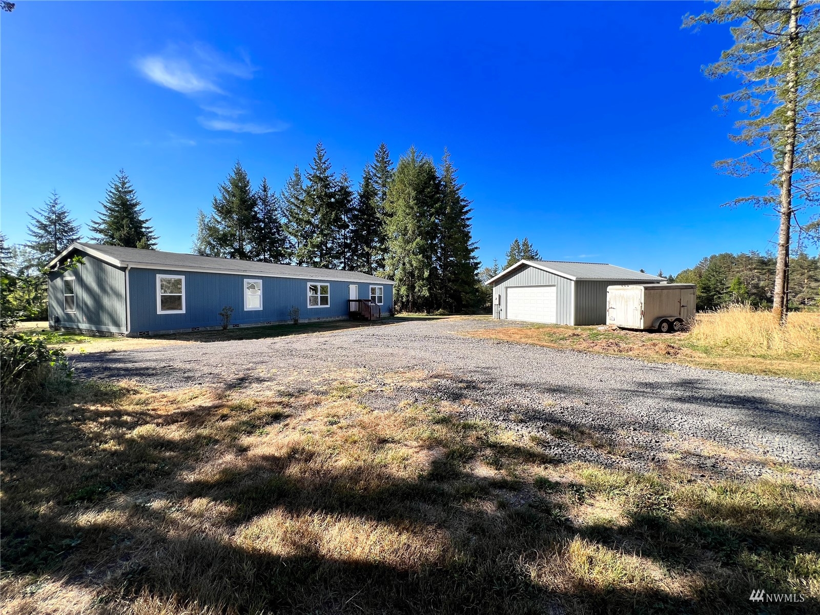 234 Boone Road Toledo, WA 98591 - Photo 33 of 33 a view of house with yard