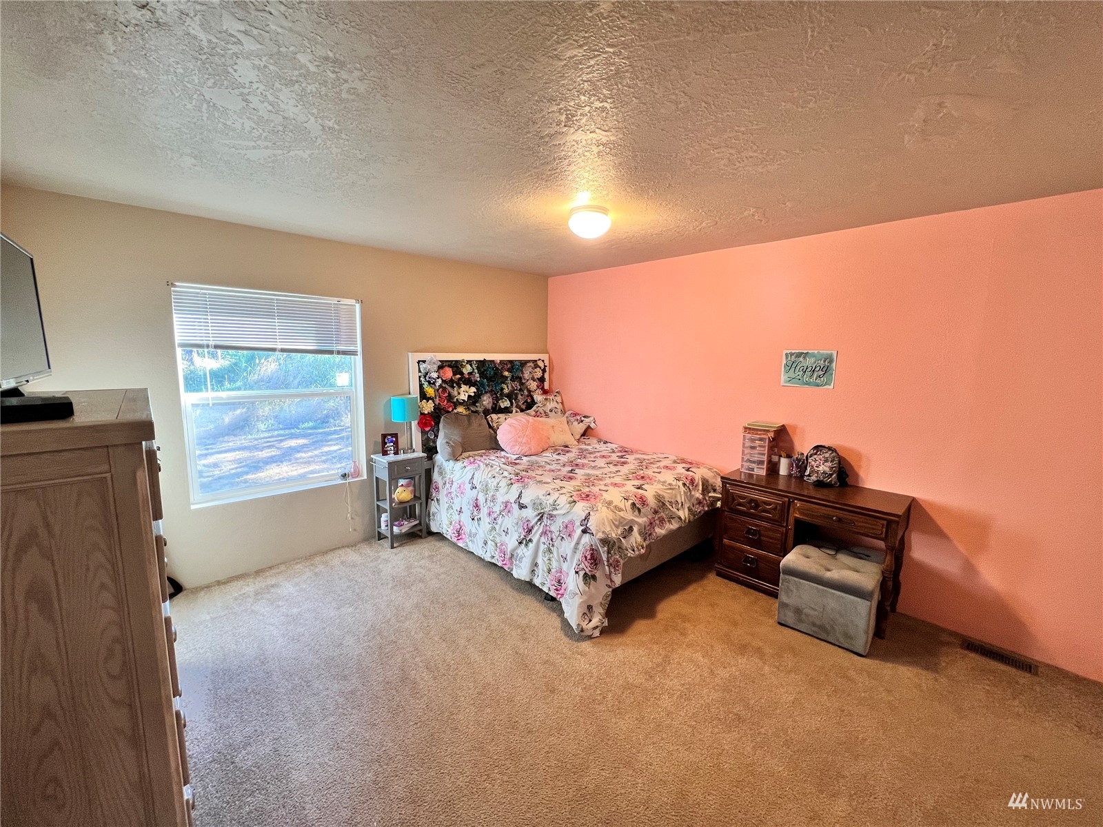 234 Boone Road Toledo, WA 98591 - Photo 9 of 33 a bedroom with a bed and a night stand