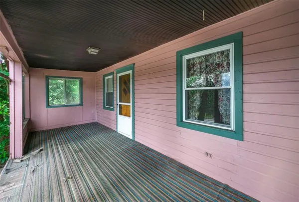 a view of a house with a porch