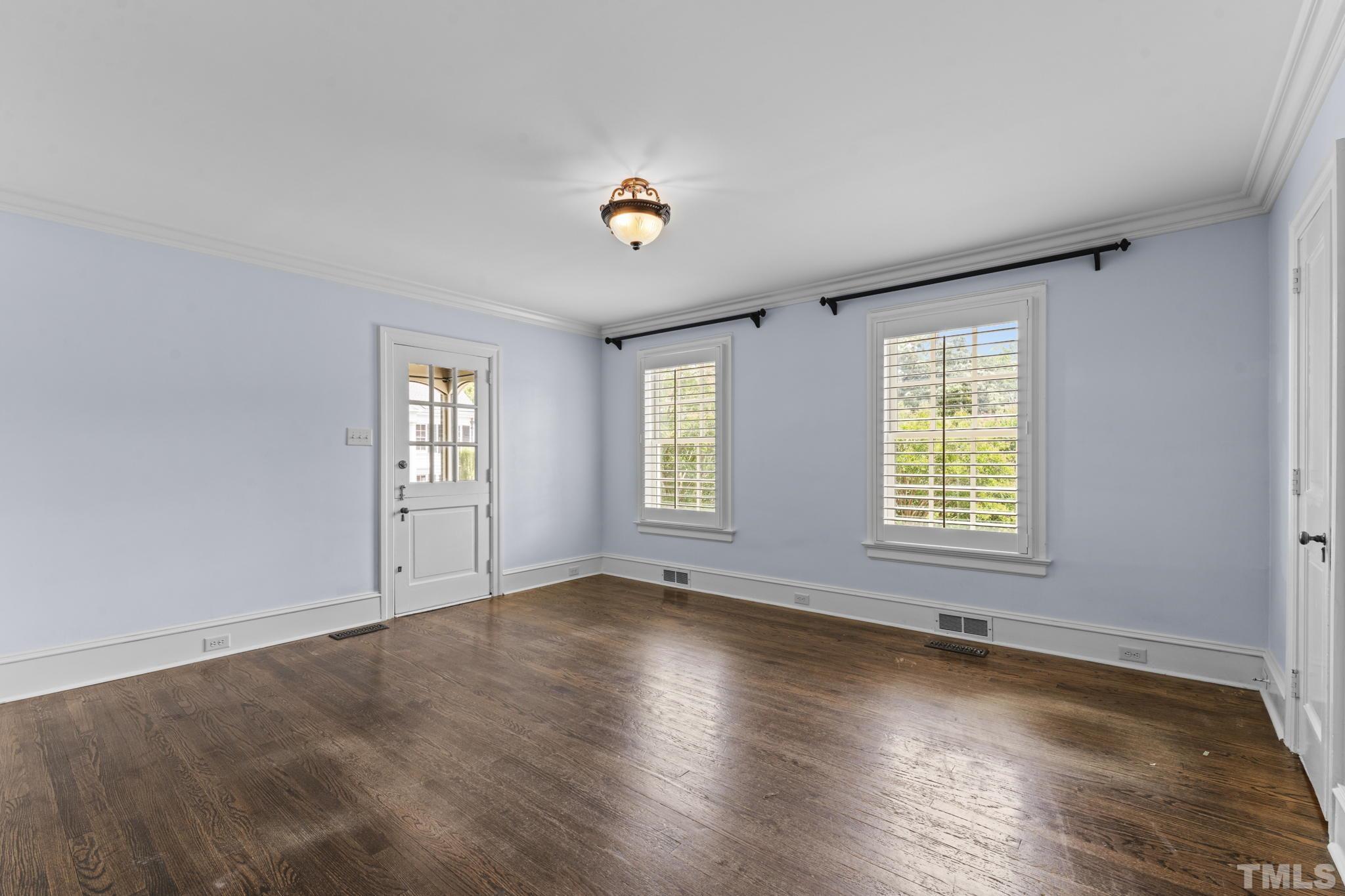 224 Hawthorne Road Raleigh, NC 27605 - Photo 12 of 46 a view of an empty room with a window