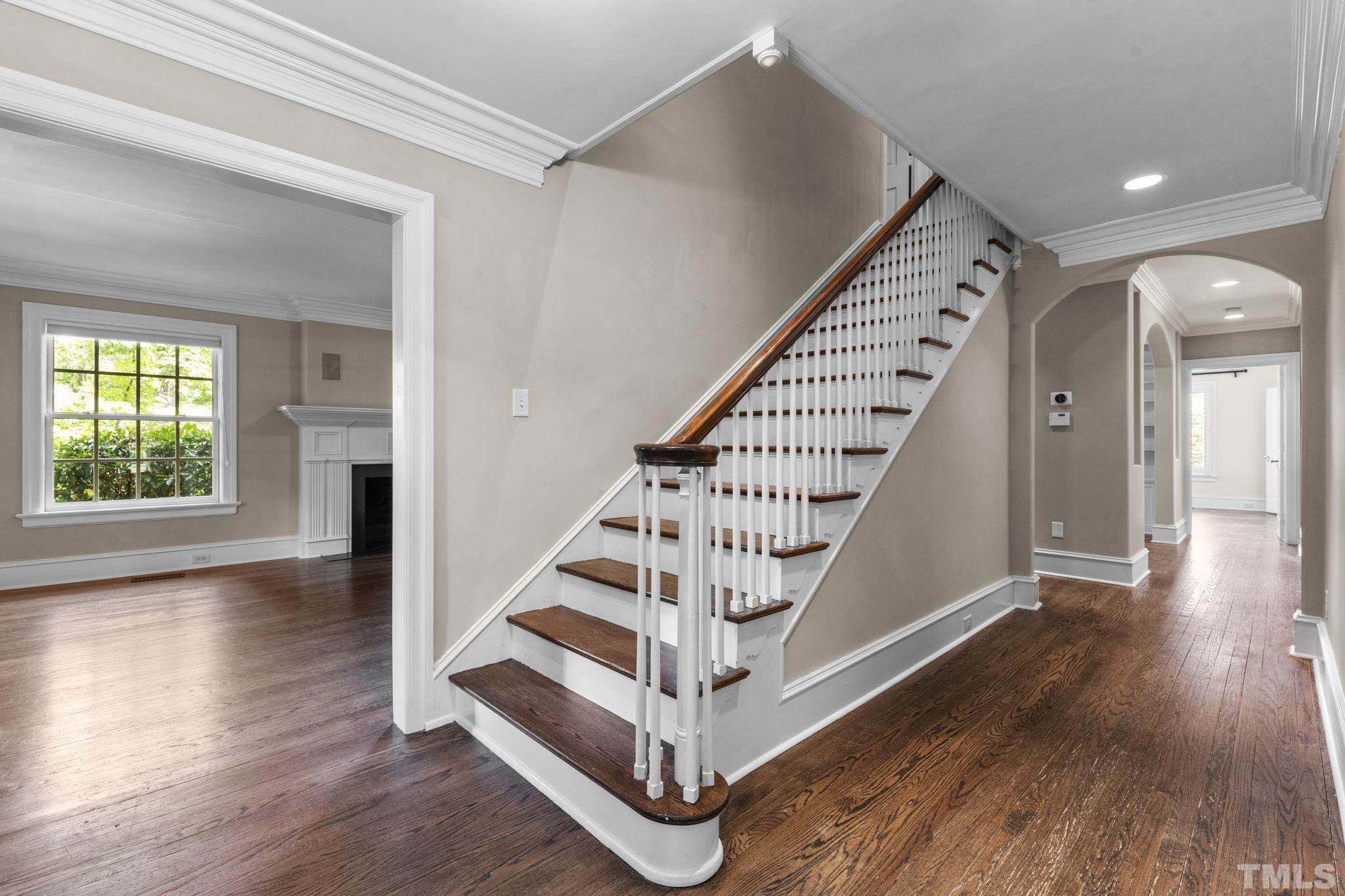 224 Hawthorne Road Raleigh, NC 27605 - Photo 3 of 46 a view of entryway and hall with wooden floor