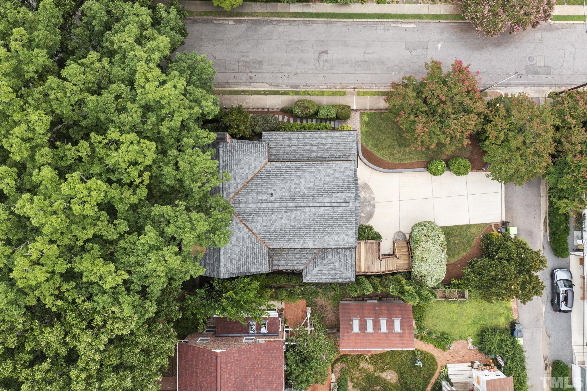 224 Hawthorne Road Raleigh, NC 27605 - Photo 45 of 46 an aerial view of a house with yard and garage
