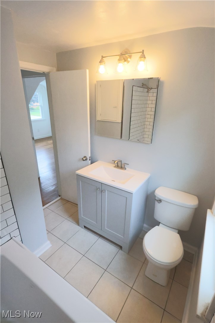 1332 South Green Road South Euclid, OH 44121 - Photo 15 of 23 Full bath with light tile patterned floors, vanity, and a shower