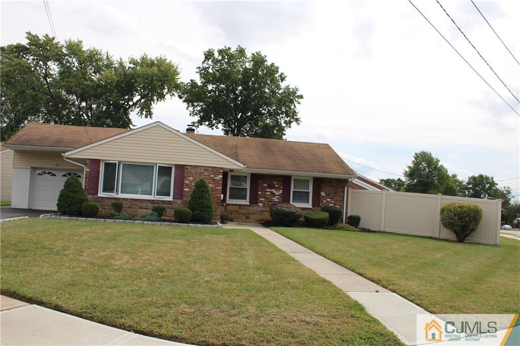 32 Gurley Road Edison, NJ 08817 - Photo 1 of 20 a front view of a house with a garden