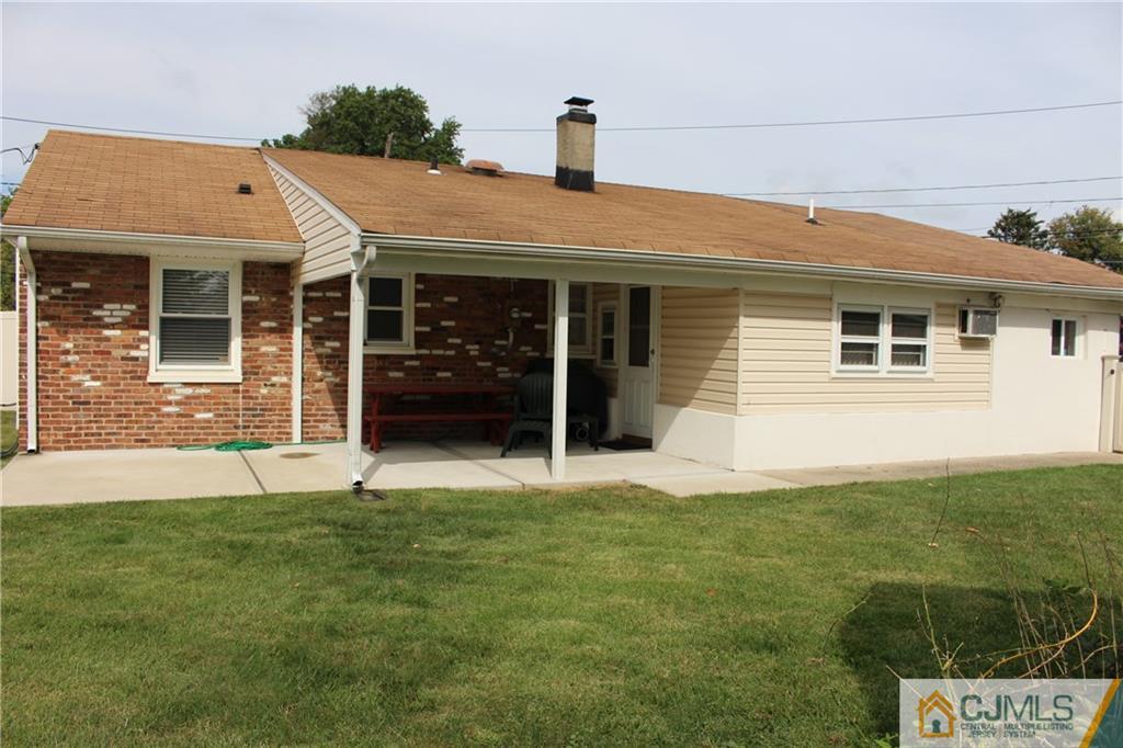 32 Gurley Road Edison, NJ 08817 - Photo 2 of 20 a front view of a house with a yard
