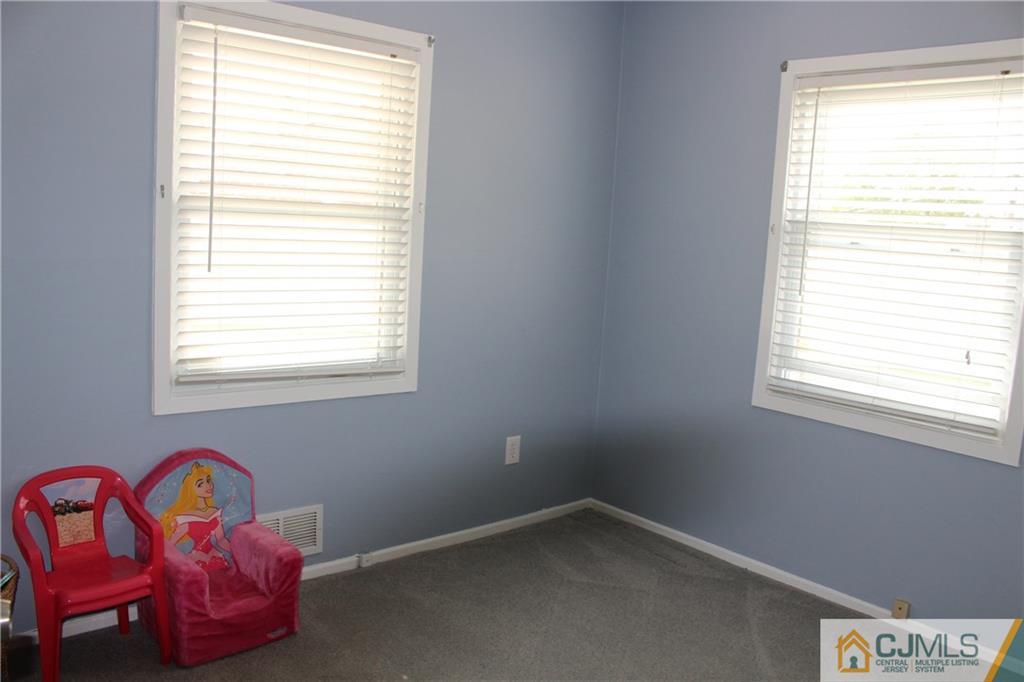 32 Gurley Road Edison, NJ 08817 - Photo 14 of 20 a room with toys and windows