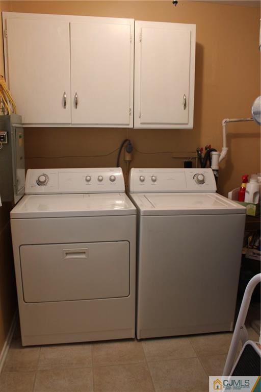 32 Gurley Road Edison, NJ 08817 - Photo 17 of 20 a utility room with dryer and washer
