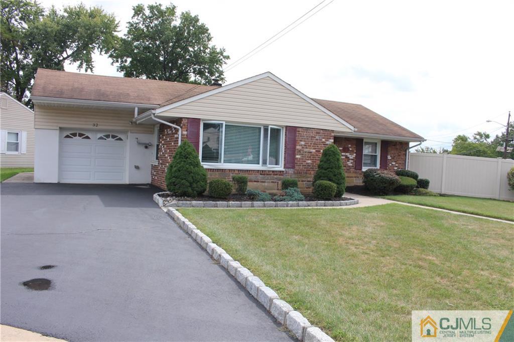32 Gurley Road Edison, NJ 08817 - Photo 20 of 20 front view of a house with a yard