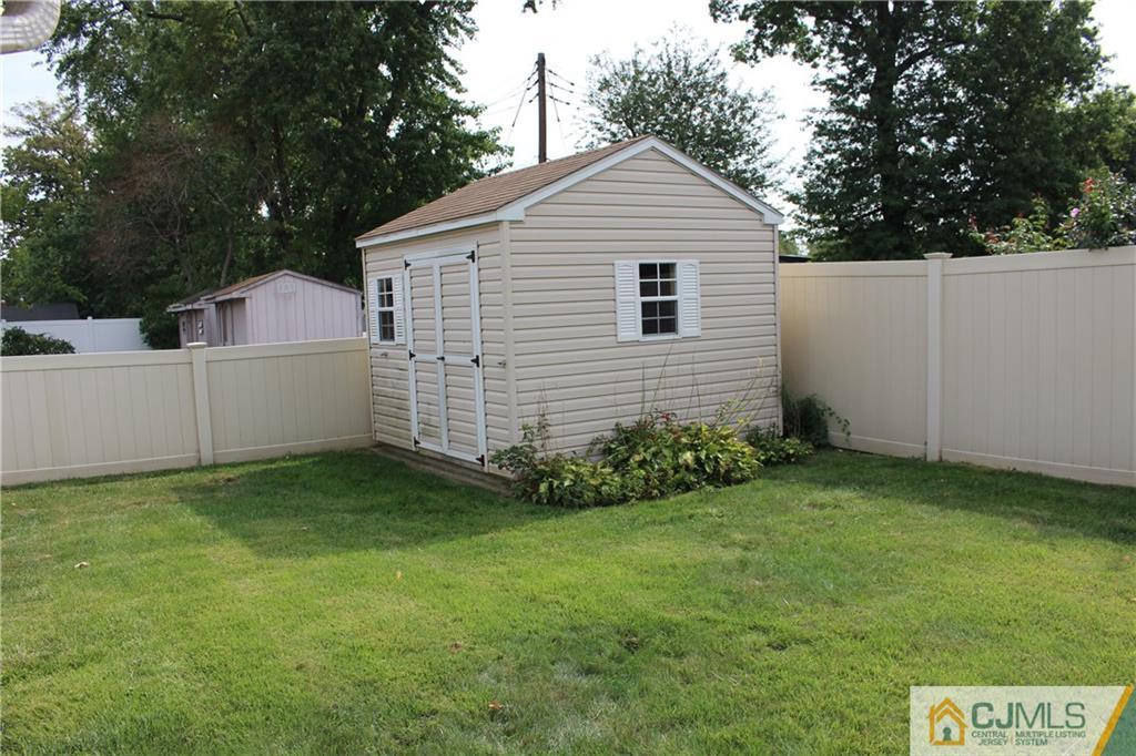 32 Gurley Road Edison, NJ 08817 - Photo 8 of 20 a view of a house with a yard