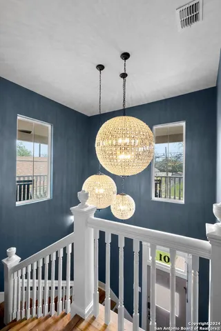 a view of a dining room and chandelier