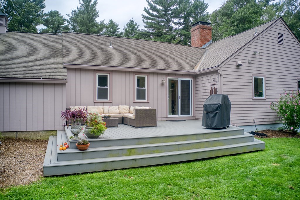 45 Towne Road Boxford, MA 01921 - Photo 7 of 42 a front view of a house with a garden