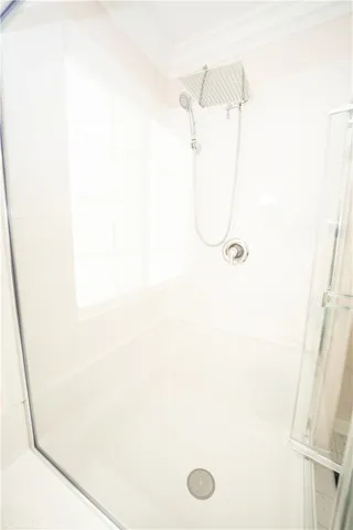 a bathroom with a sink vanity mirror and toilet