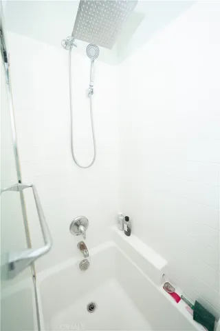 a view of a terrace with a yard and mountain view