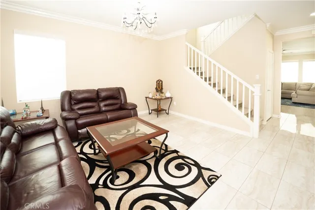 a living room with furniture and view of living room