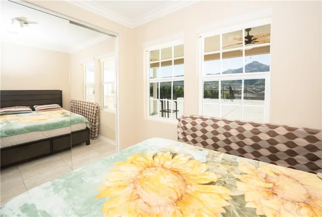 an aerial view of residential house and sandy dunes