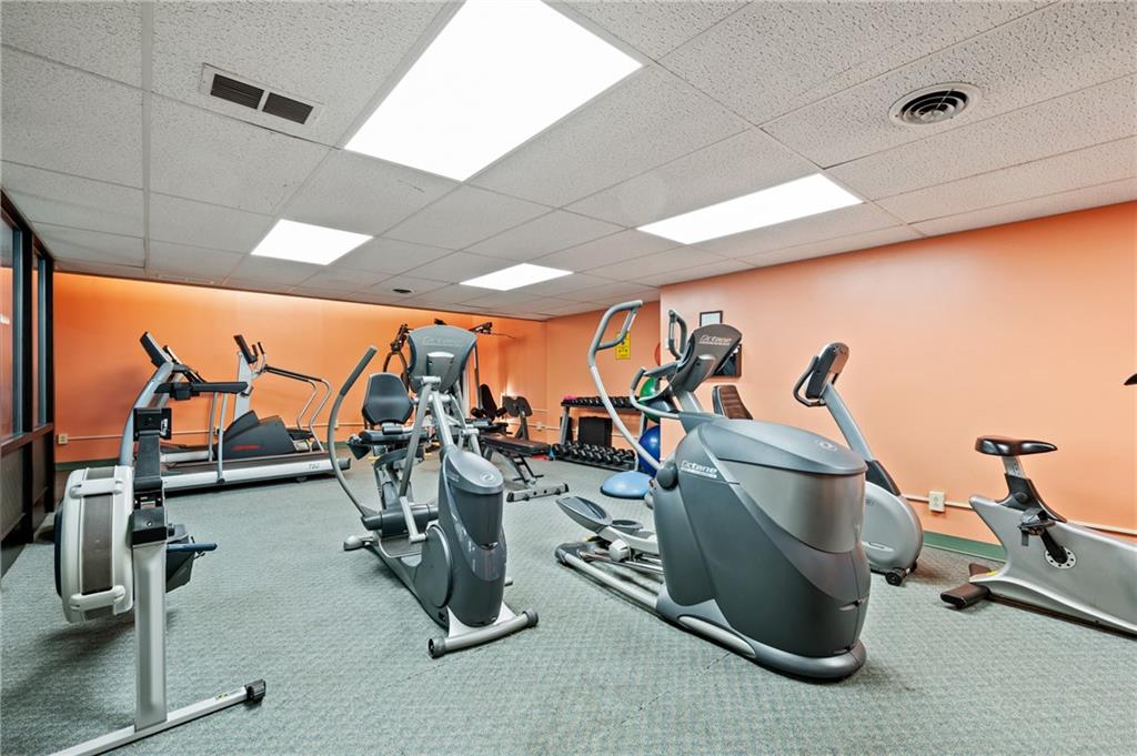 307 South Dithridge Street, Unit 11 Pittsburgh, PA 15213 - Photo 5 of 25 a view of a room with gym equipment