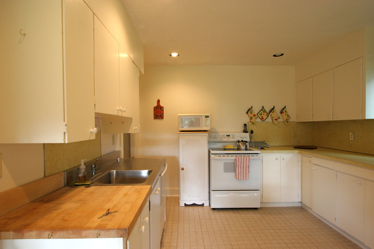1730 State Road Richmond, MA 01254 - Photo 8 of 37 a kitchen with stainless steel appliances granite countertop a sink and cabinets