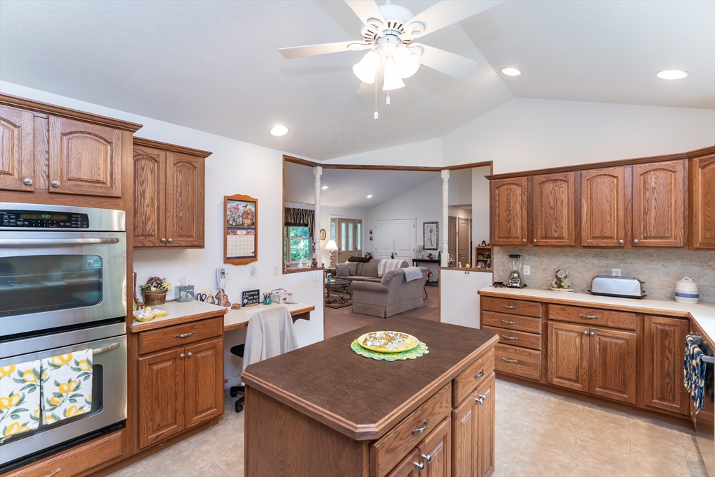 216 Palmer Road Brimfield, MA 01010 - Photo 17 of 25 a kitchen with a stove a sink and a microwave