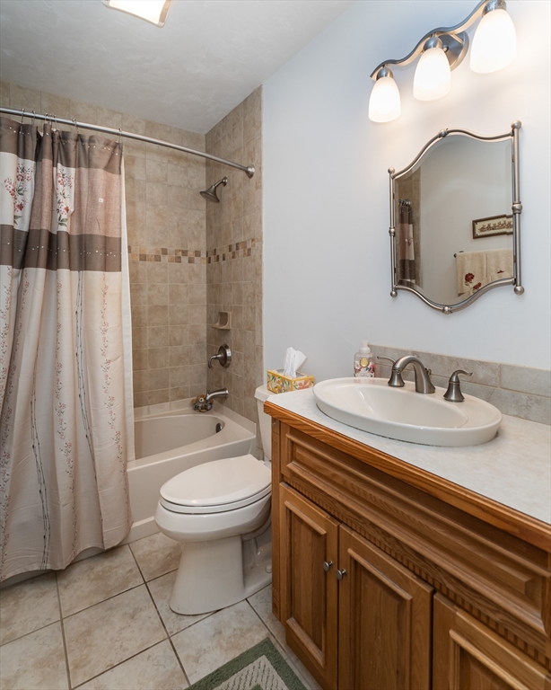 216 Palmer Road Brimfield, MA 01010 - Photo 19 of 25 a bathroom with a sink toilet and shower