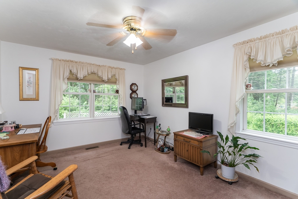 216 Palmer Road Brimfield, MA 01010 - Photo 23 of 25 a livingroom with workspace and a window