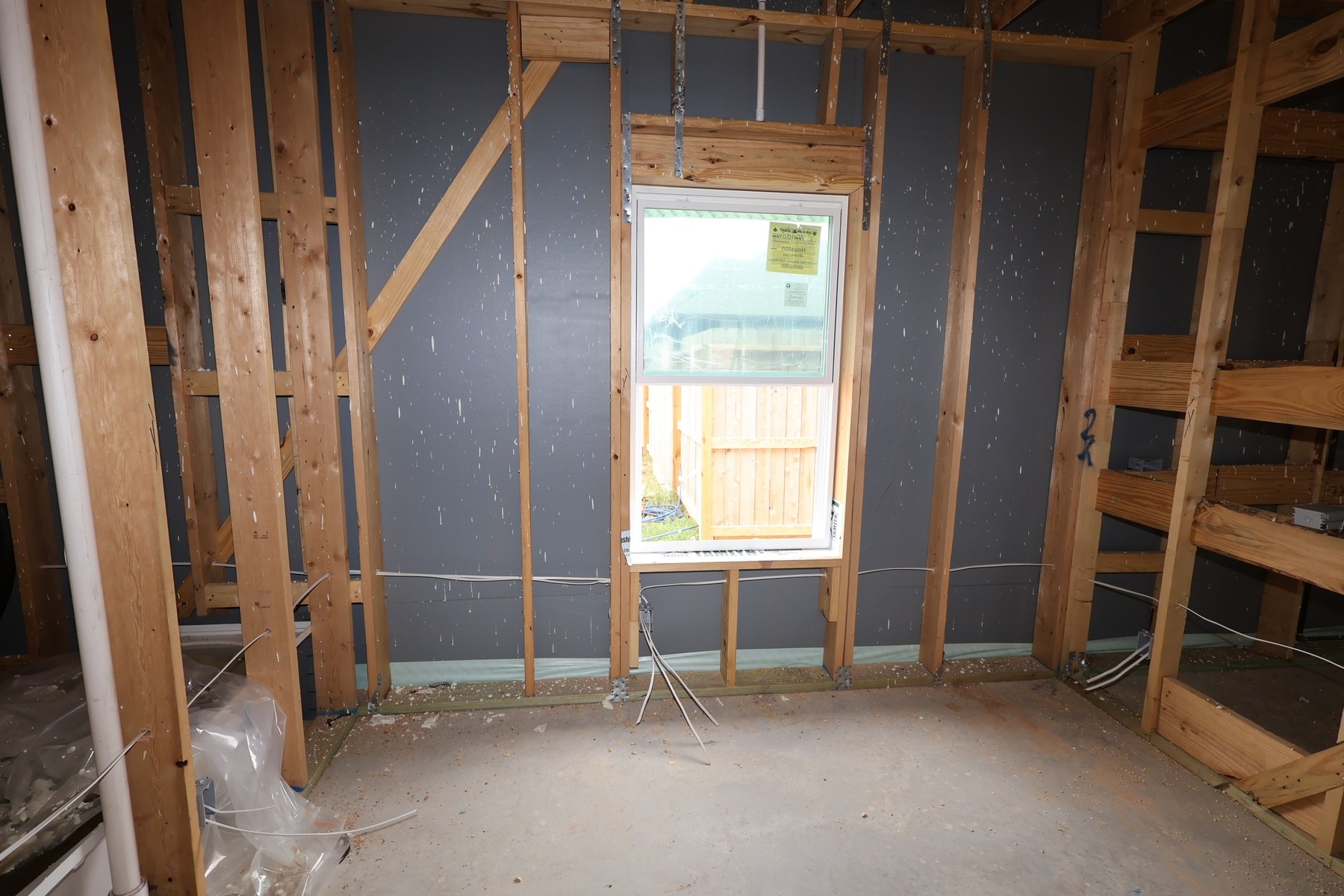 2834 Gdn Mdw Street Fulshear, TX 77423 - Photo 5 of 17 an empty room with windows