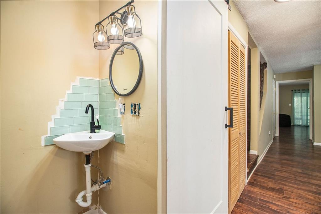 4 Quail Run Decatur, GA 30035 - Photo 13 of 23 a bathroom with a sink and a mirror