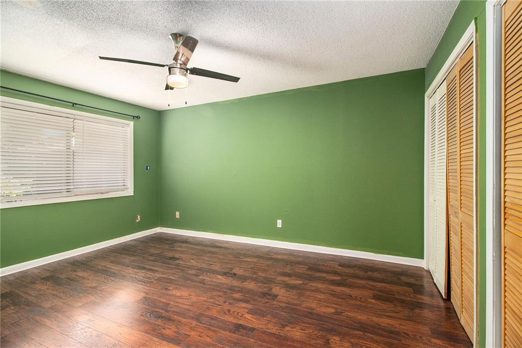 4 Quail Run Decatur, GA 30035 - Photo 14 of 23 a view of empty room with wooden floor and fan