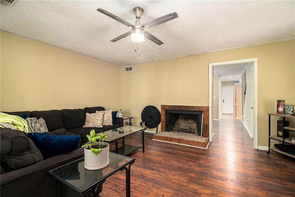 4 Quail Run Decatur, GA 30035 - Photo 5 of 23 a living room with furniture and a fireplace