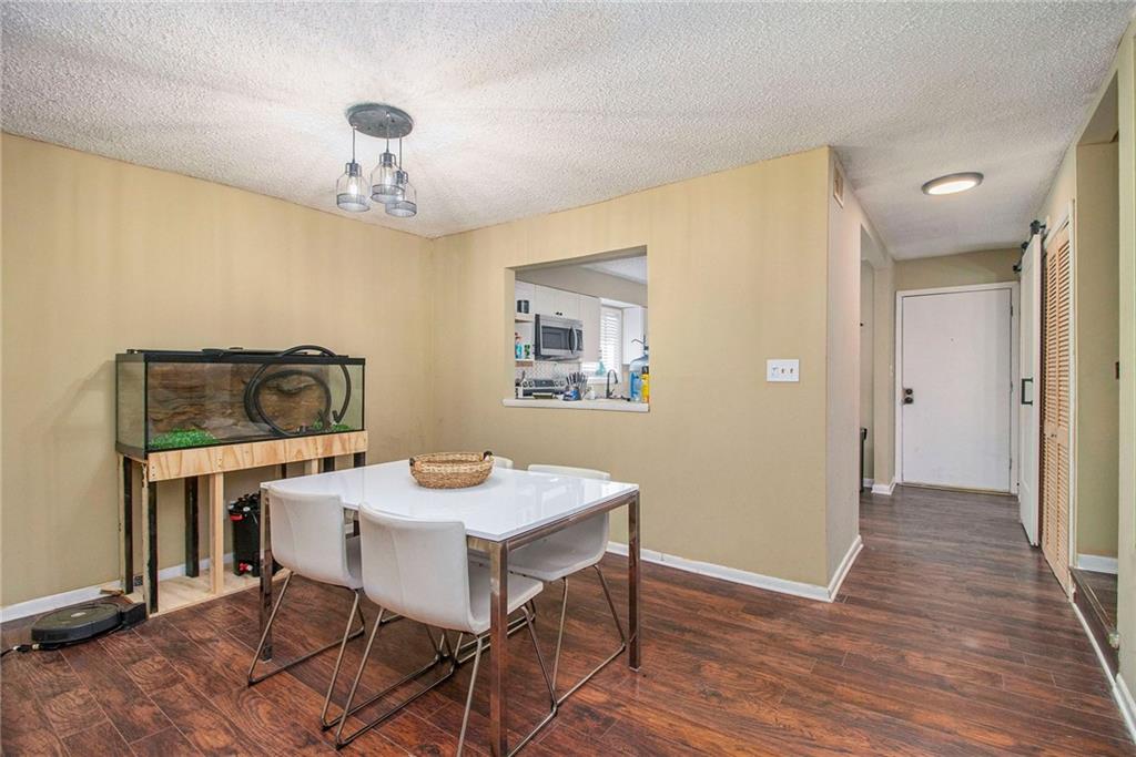 4 Quail Run Decatur, GA 30035 - Photo 10 of 23 a view of a dining room with furniture window and wooden floor
