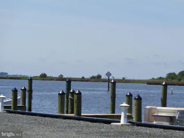 a view of a brick house with an outdoor space