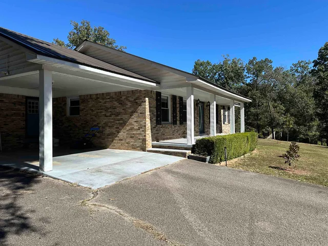 a view of a house with a patio