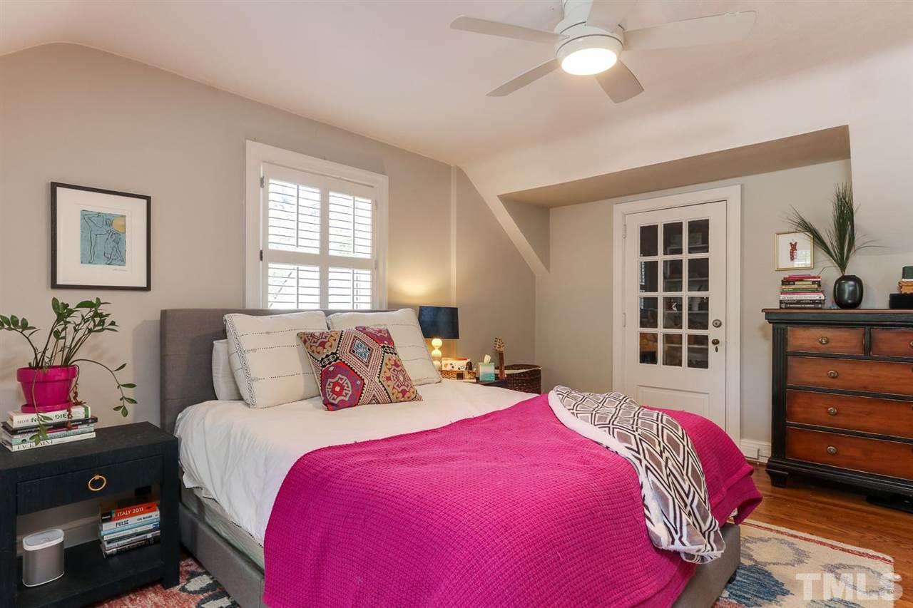 2720 Bedford Avenue Raleigh, NC 27607 - Photo 22 of 30 a bedroom with a bed and a dresser