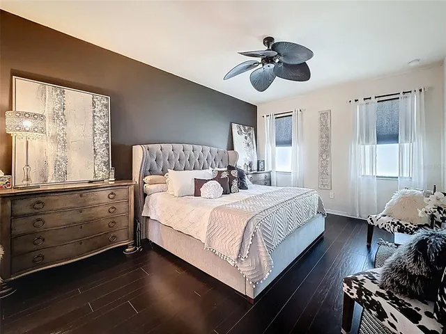 a bed room with a bed and a window