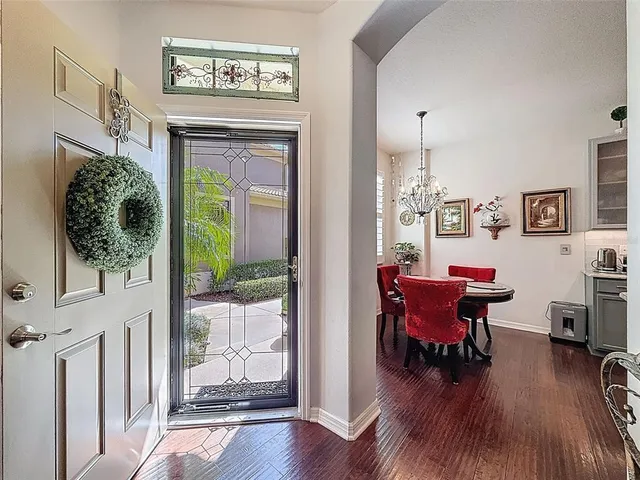 a view of a livingroom with furniture and a window