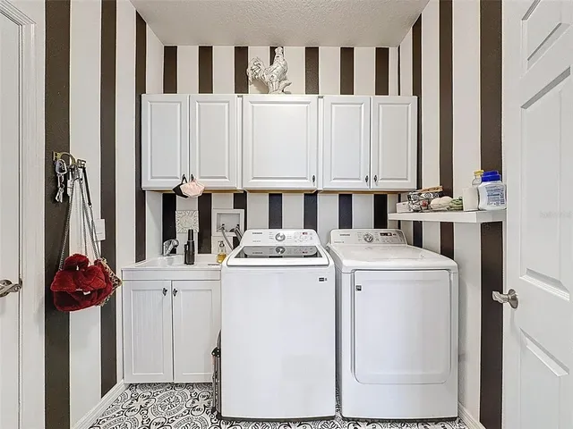 a view of washer and dryer with around it