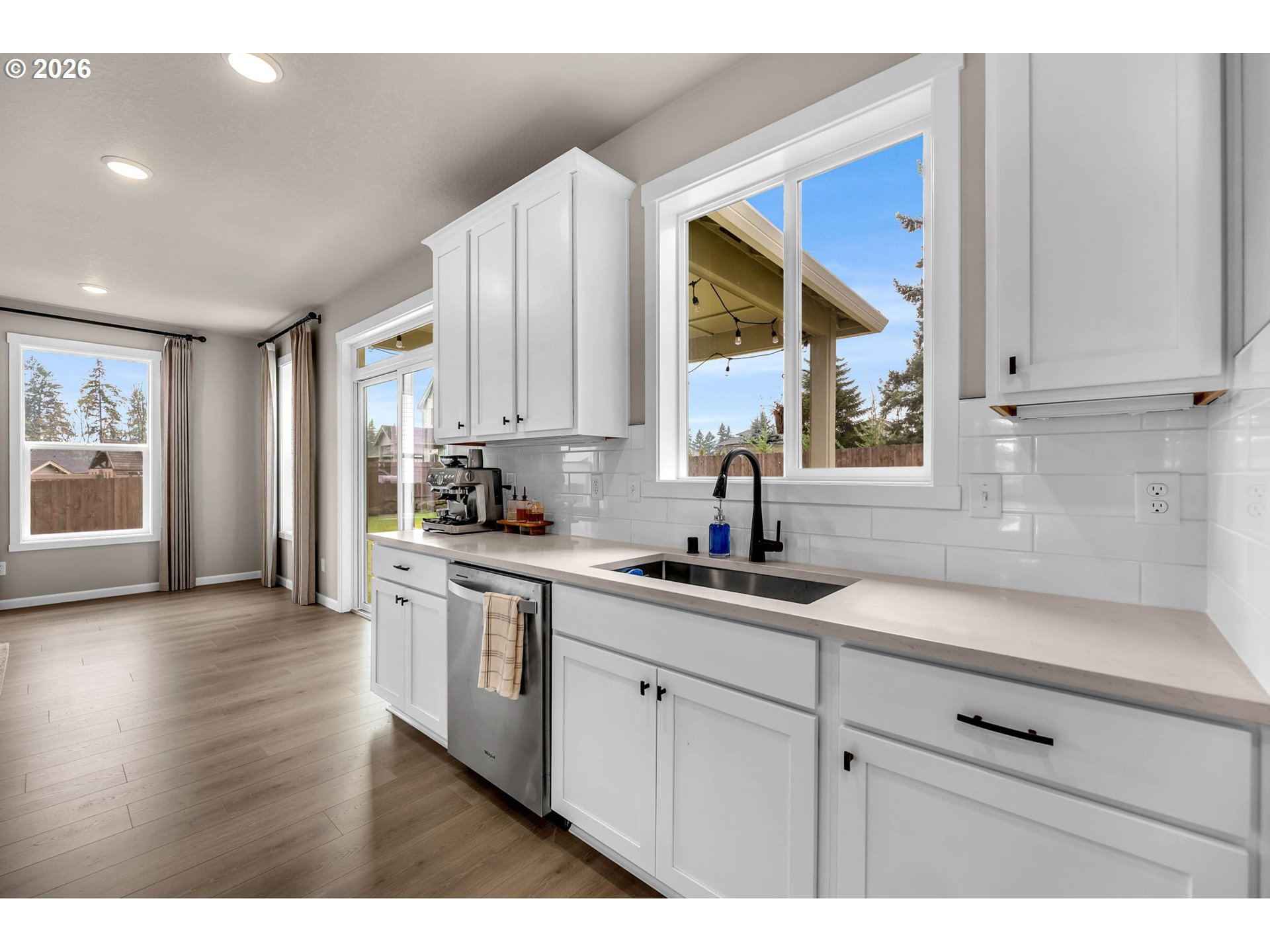 2814 Northwest 8th Place Battle Ground, WA 98604 - Photo 20 of 41 a kitchen with a sink cabinets and window