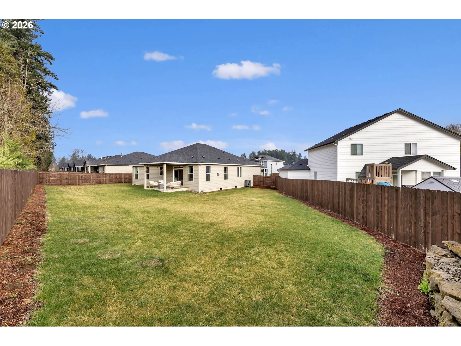 2814 Northwest 8th Place Battle Ground, WA 98604 - Photo 2 of 41 a front view of a house with garden