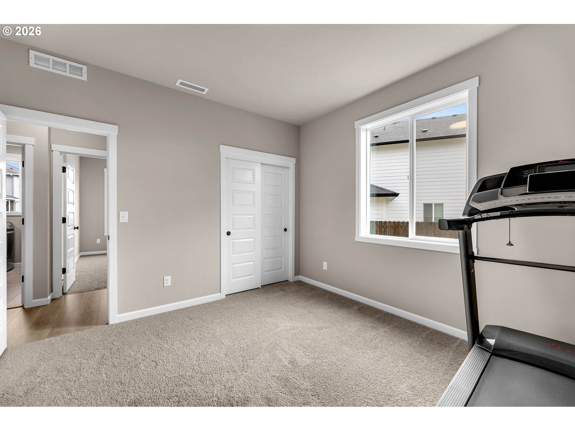 2814 Northwest 8th Place Battle Ground, WA 98604 - Photo 27 of 41 a view of empty room with wooden floor