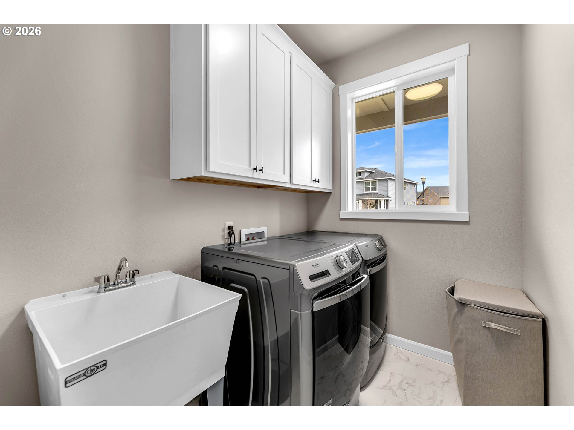 2814 Northwest 8th Place Battle Ground, WA 98604 - Photo 29 of 41 a utility room with sink dryer and washer