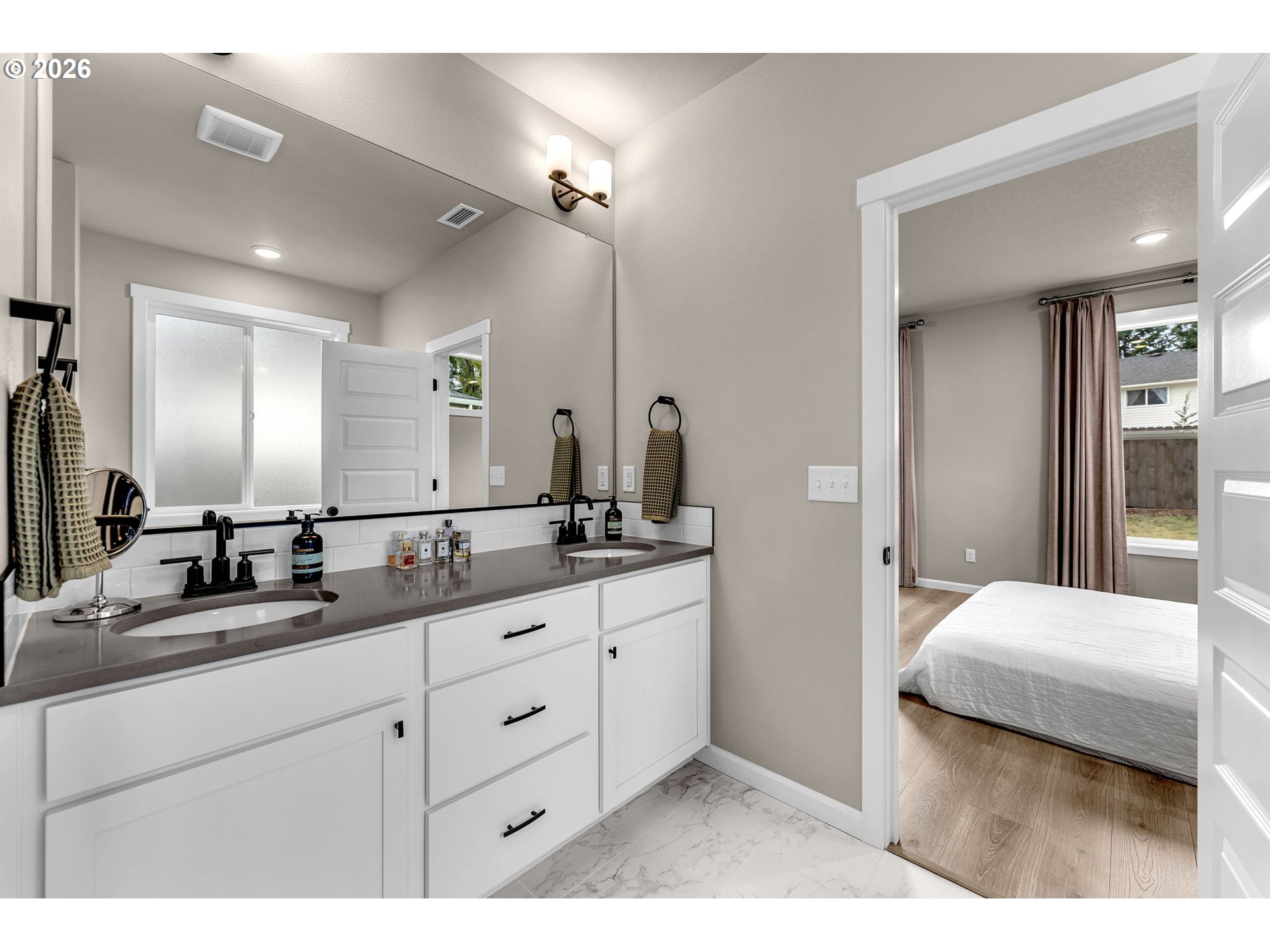 2814 Northwest 8th Place Battle Ground, WA 98604 - Photo 30 of 41 a en suite bathroom with double sink and a mirror