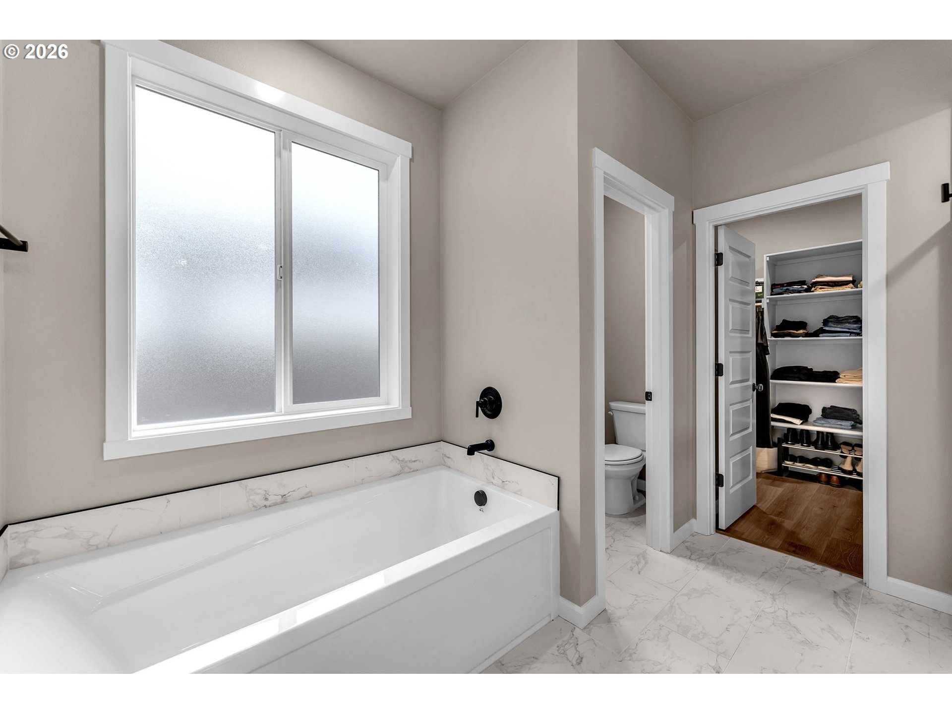 2814 Northwest 8th Place Battle Ground, WA 98604 - Photo 32 of 41 a bathroom with a bathtub and a shower