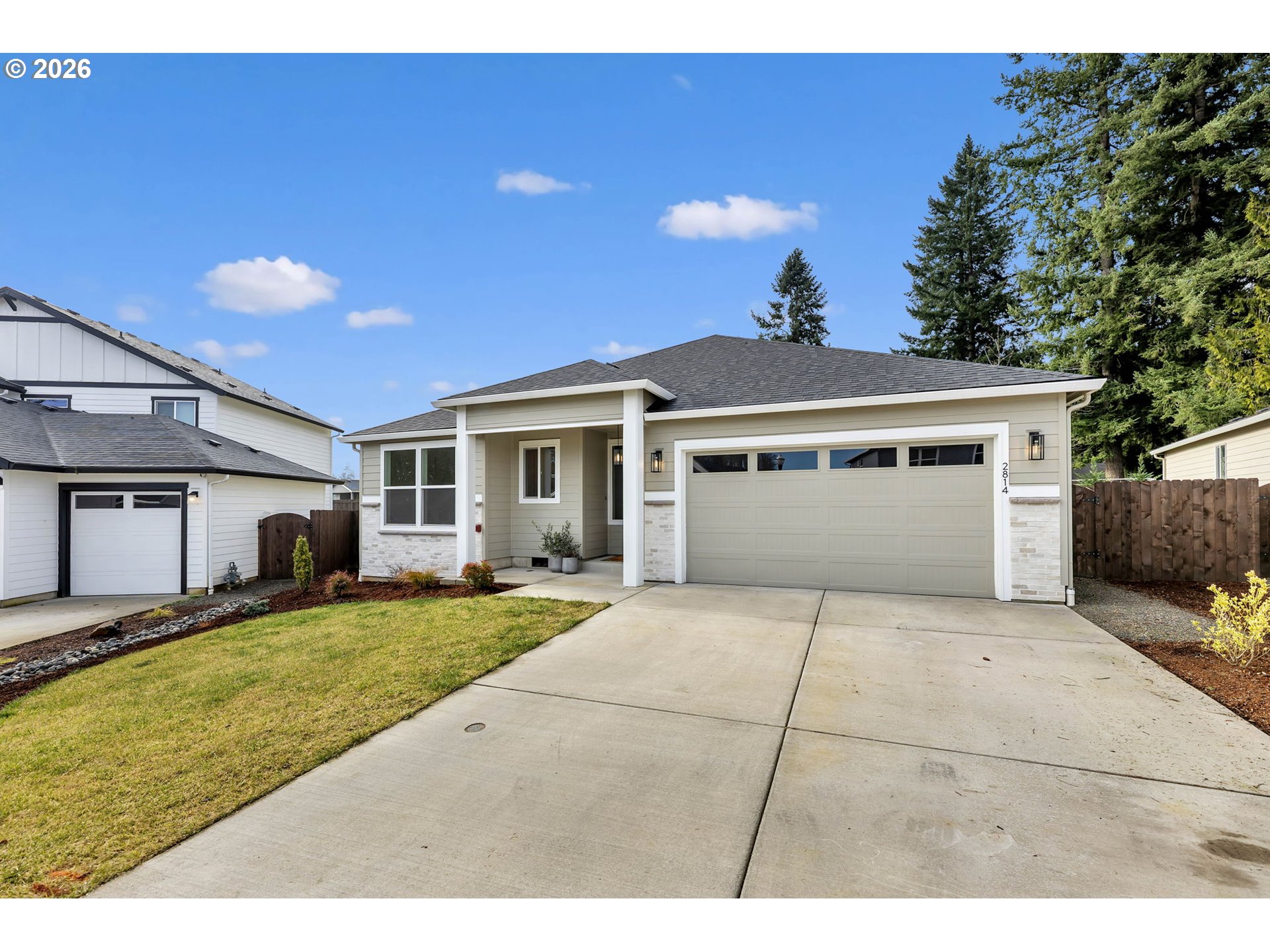 2814 Northwest 8th Place Battle Ground, WA 98604 - Photo 39 of 41 a view of a house with a patio