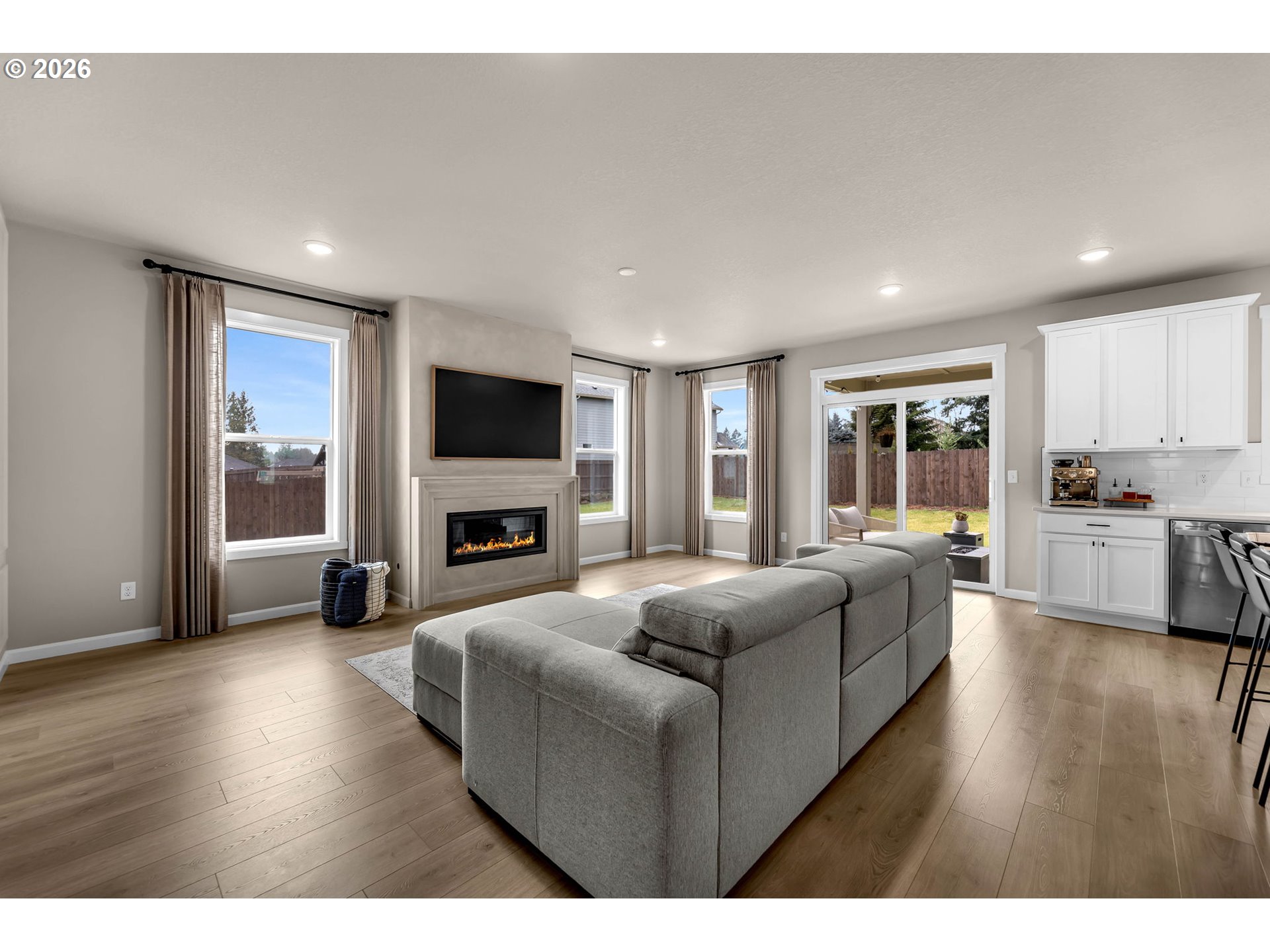 2814 Northwest 8th Place Battle Ground, WA 98604 - Photo 4 of 41 a living room with furniture and a flat screen tv