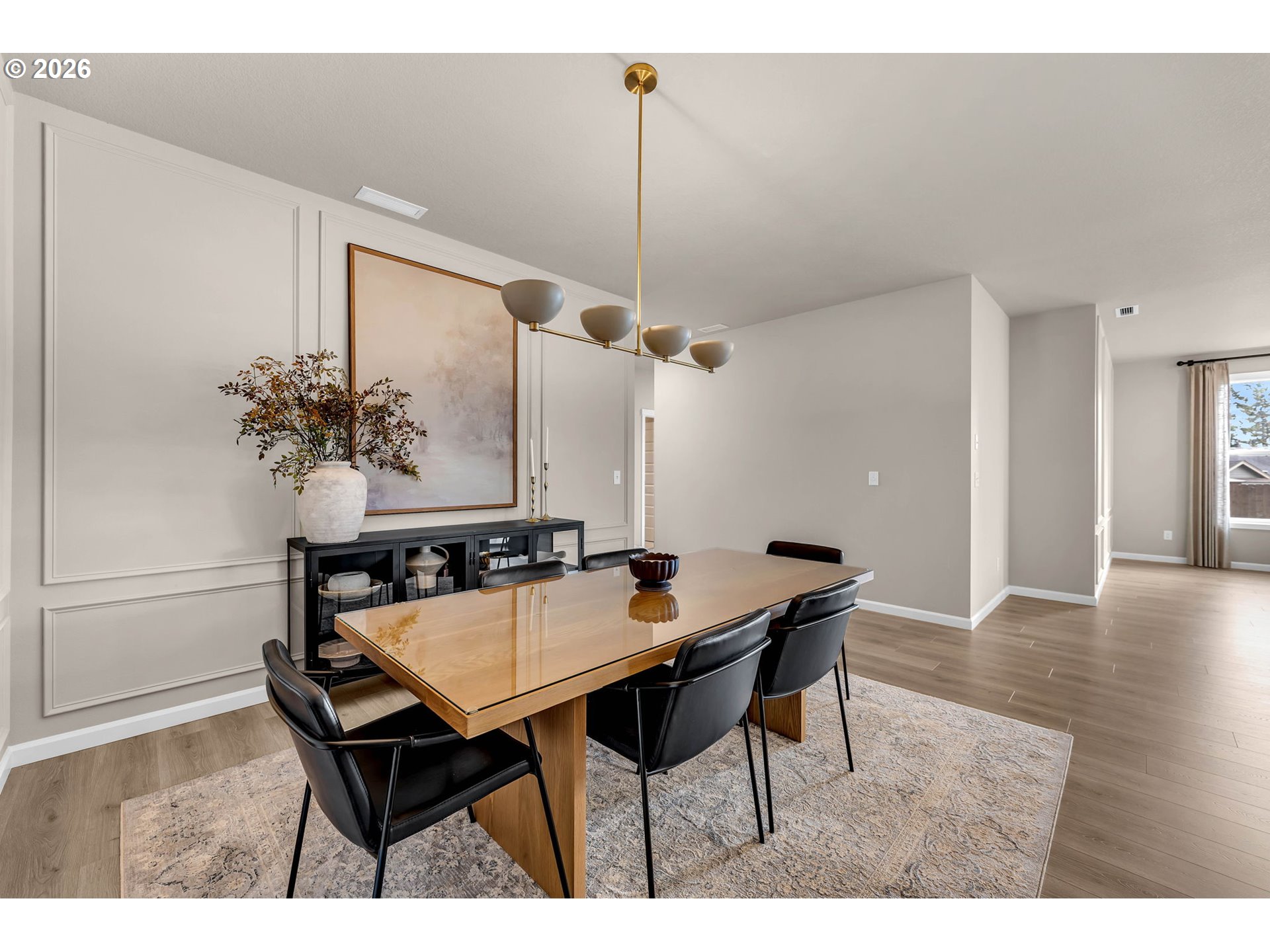 2814 Northwest 8th Place Battle Ground, WA 98604 - Photo 7 of 41 a dining room with furniture and wooden floor