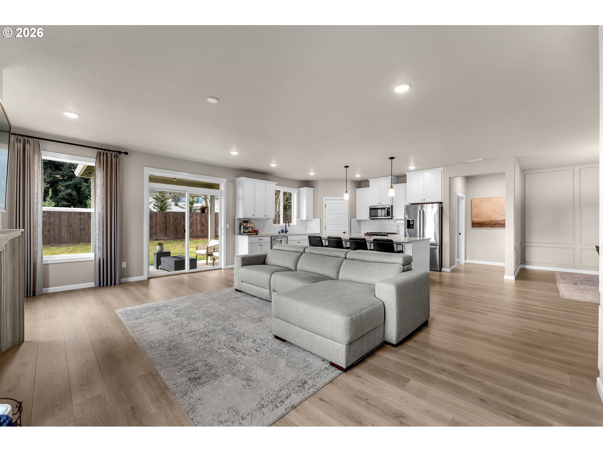 2814 Northwest 8th Place Battle Ground, WA 98604 - Photo 8 of 41 a living room with furniture and a wooden floor