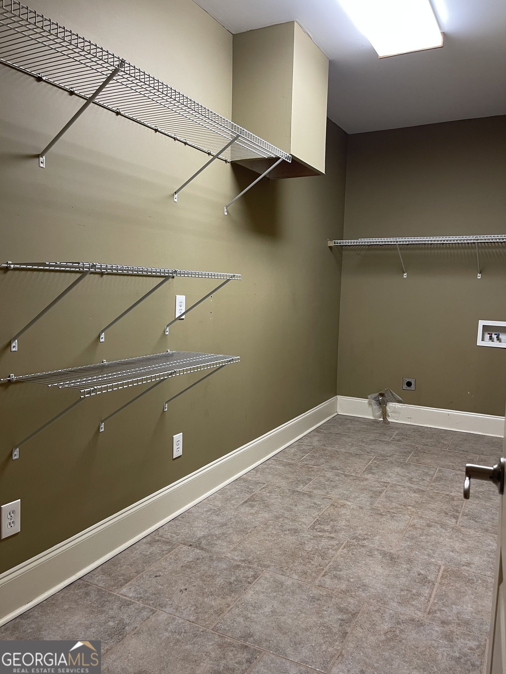 3910 Barnett Shoals Road Athens, GA 30605 - Photo 15 of 30 a view of a room with racks on the wall