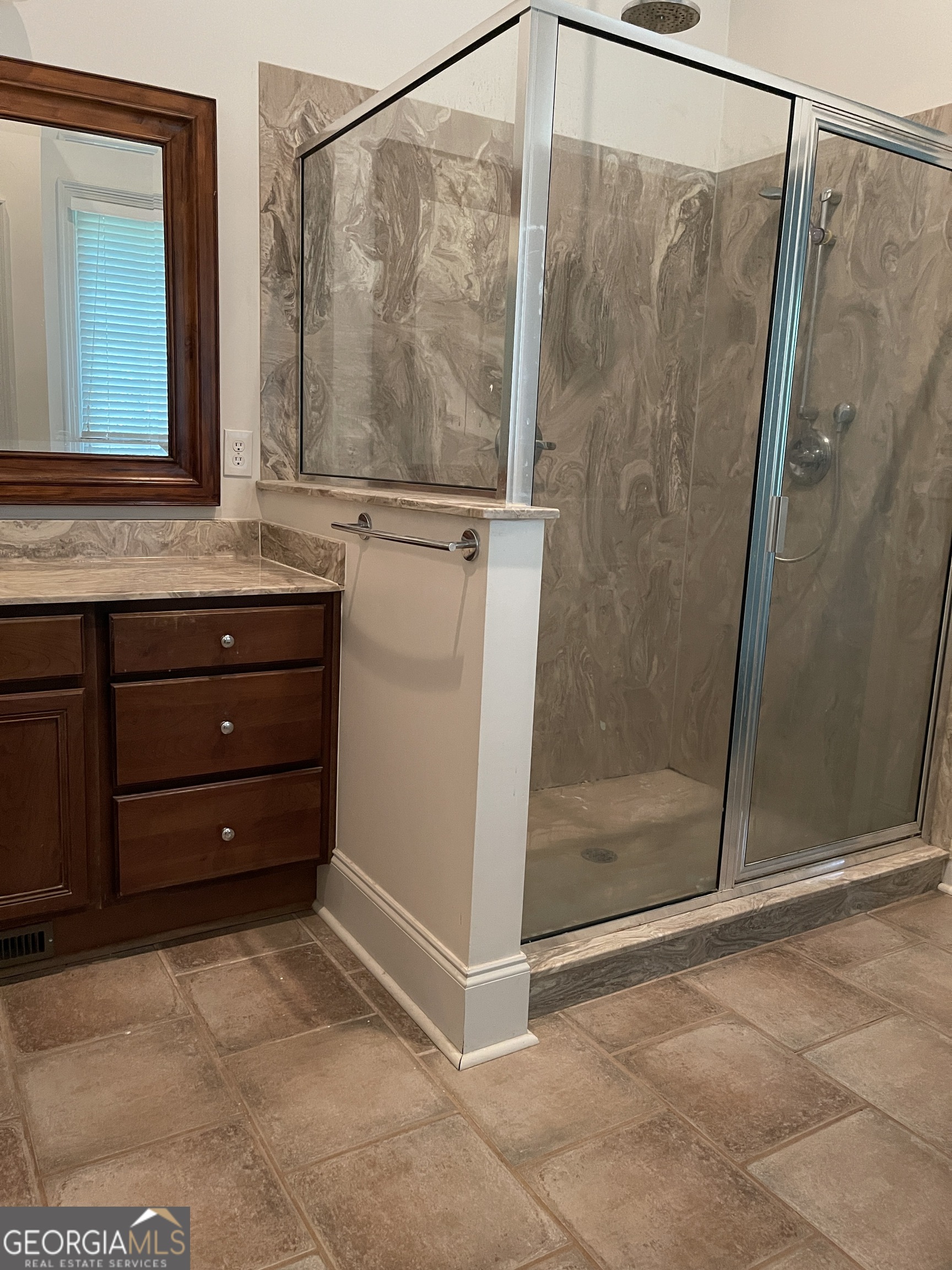 3910 Barnett Shoals Road Athens, GA 30605 - Photo 21 of 30 a bathroom with a shower and a sink