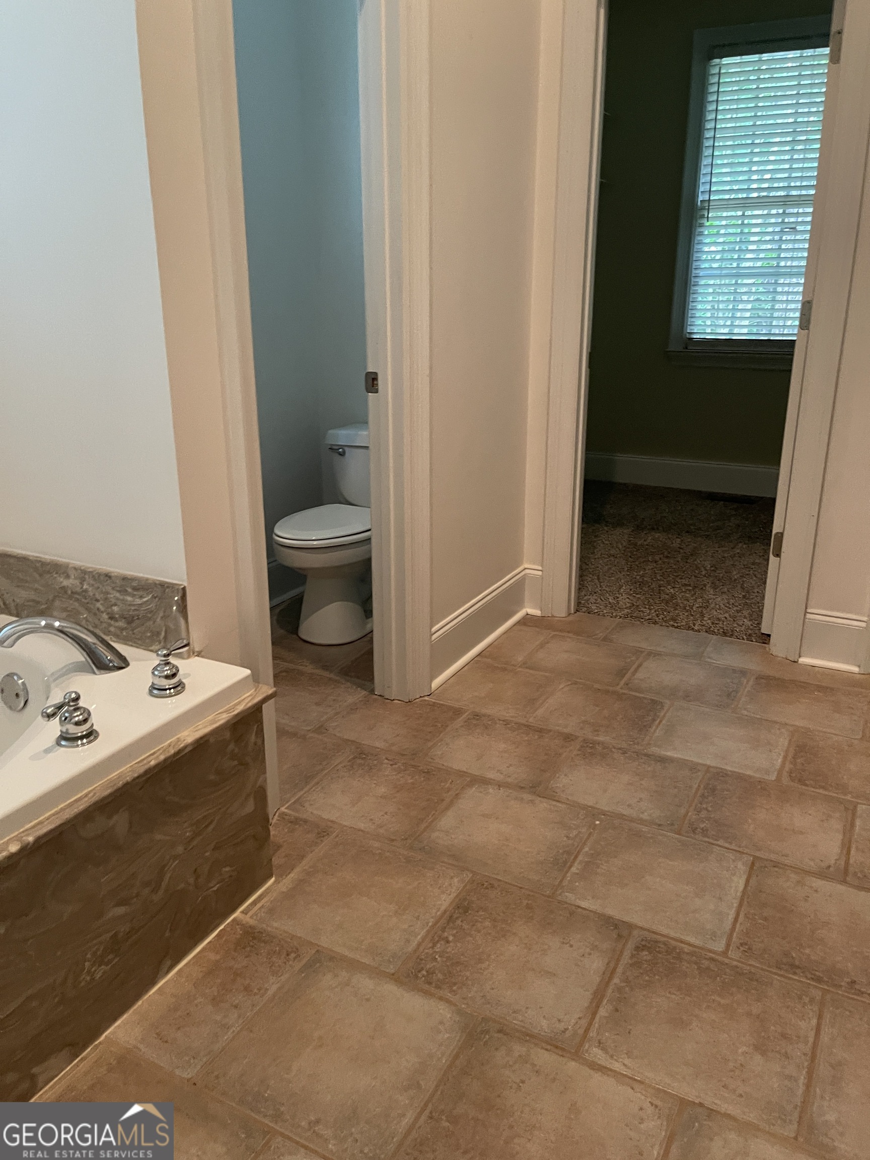 3910 Barnett Shoals Road Athens, GA 30605 - Photo 24 of 30 a view of utility room with washer and dryer