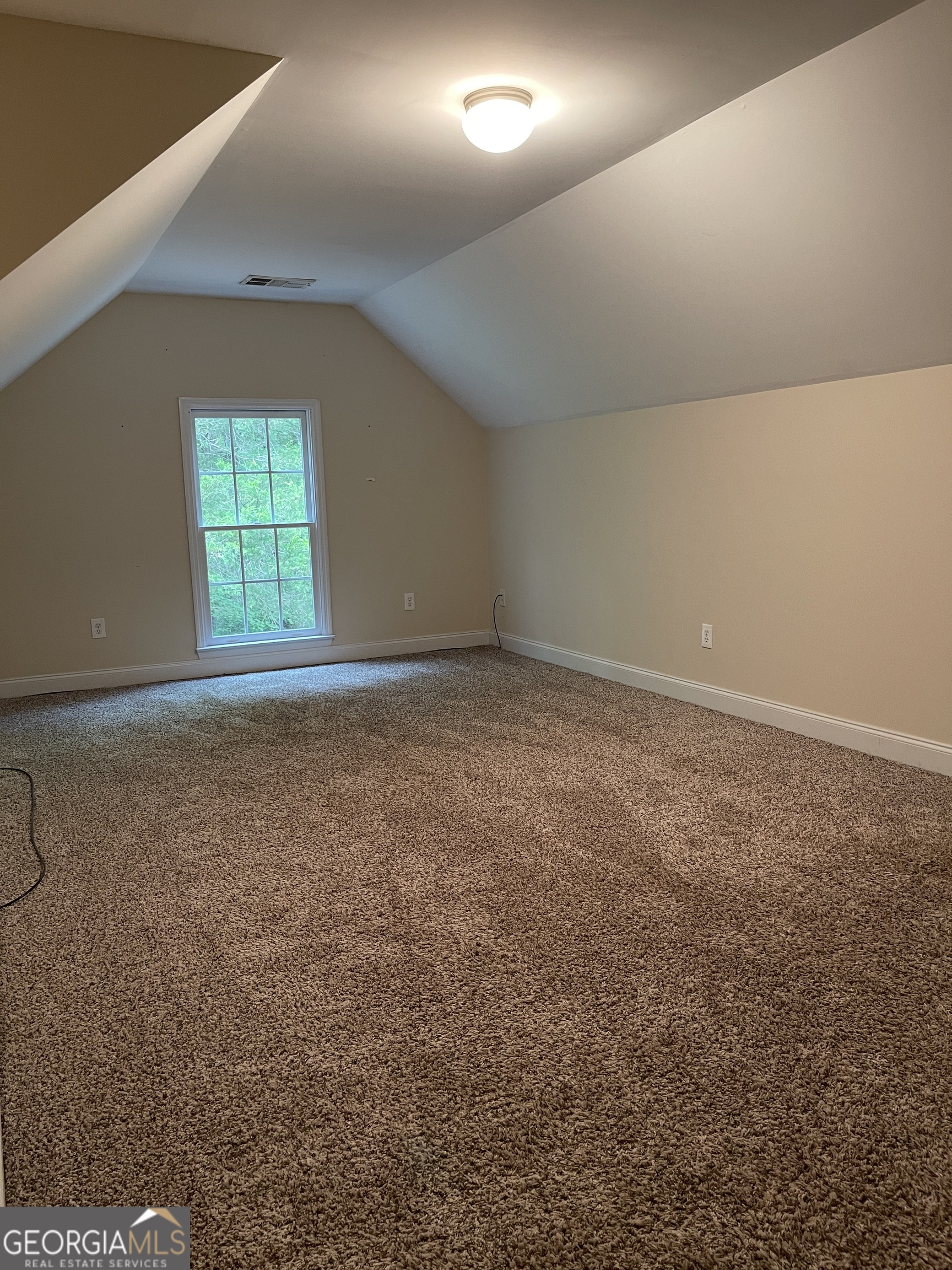 3910 Barnett Shoals Road Athens, GA 30605 - Photo 25 of 30 an empty room with a window