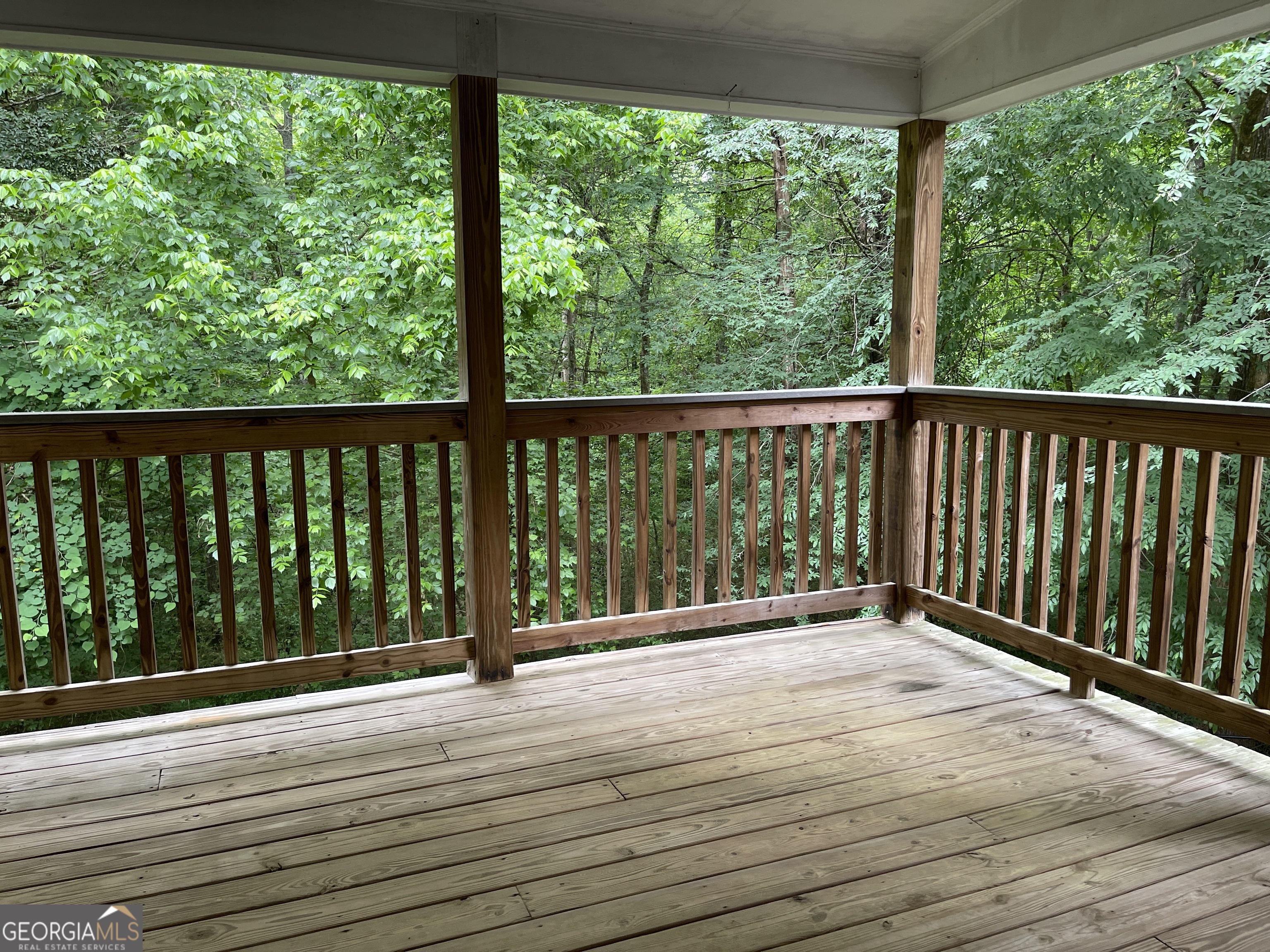3910 Barnett Shoals Road Athens, GA 30605 - Photo 8 of 30 a view of balcony with wooden floor